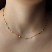 Le collier de station CZ à lunette perlée