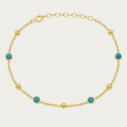 Le bracelet de station à lunette turquoise perlée