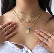 The Lucky Blue Bead and Cross Necklace