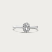 The Mini Oval Solitaire Ring with Pave Halo