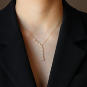 The Graduated Dangling Pear Stone Necklace