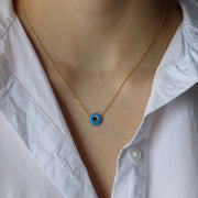 Le collier opale mauvais œil