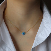 Le collier opale mauvais œil