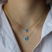 Le collier opale mauvais œil