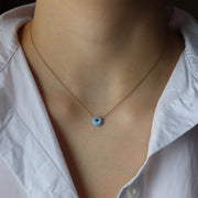 Le collier opale mauvais œil