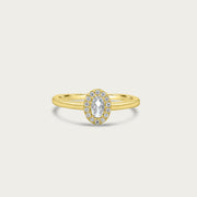 The Mini Oval Solitaire Ring with Pave Halo
